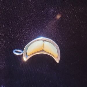 Quarter moon silver and ivory pendant